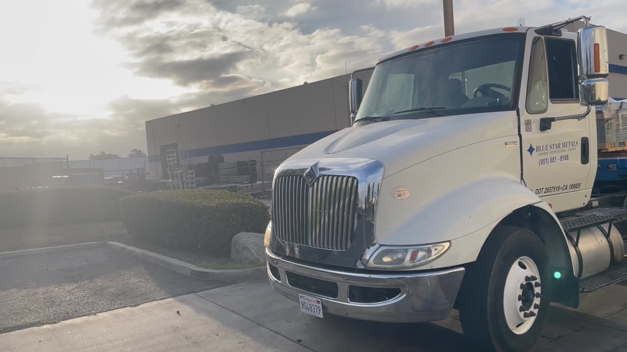 Loaded Blue Star Metals truck and trailer